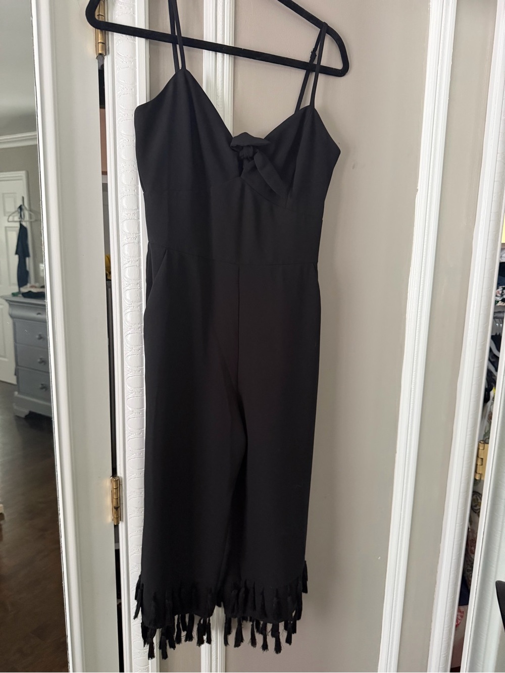 Adelyn Rae Black Sleeveless Tie-Front Jumpsuit with Fringe Hem
